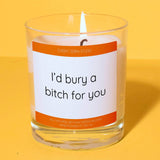 a candle with a label that says i'd burn a bitch for you