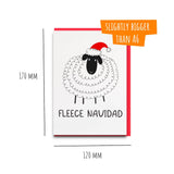 a card with a picture of a sheep wearing a santa hat