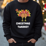 a man wearing a black christmas sweater with a turkey on it