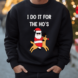 a man wearing a black sweatshirt with a santa clause on it