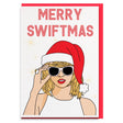 a woman wearing a santa hat and sunglasses