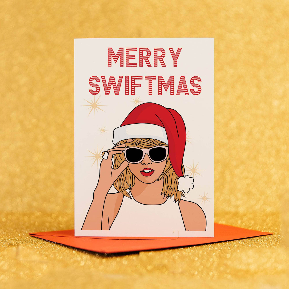 a card with a picture of a woman wearing a santa hat and sunglasses